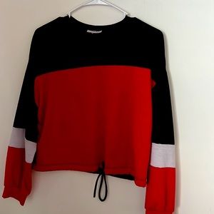 Black, white, and red long sleeve shirt